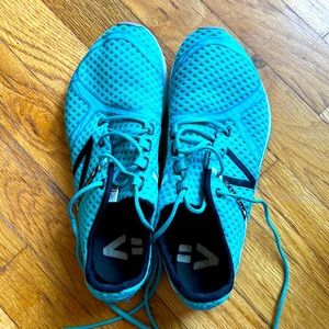 New Balance Teal Minimus running shoes